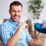 Portrait of confident man in home office